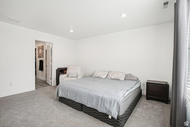 carpeted bedroom featuring recessed lighting, baseboards, and visible vents