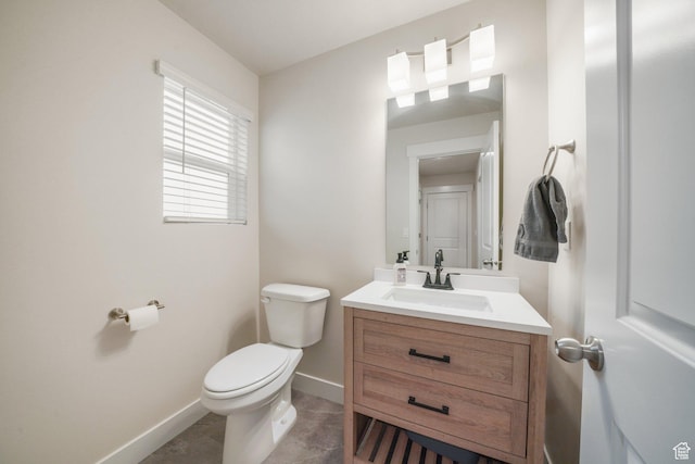 4576 W Sentry Dr, Riverton, UT 84096 - bathroom with baseboards, toilet, and vanity