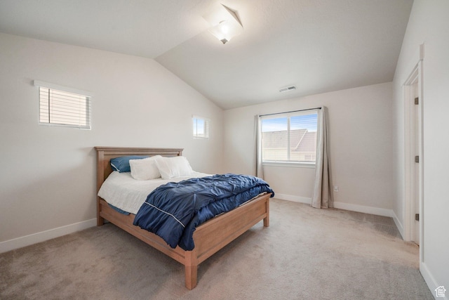 4576 W Sentry Dr, Riverton, UT 84096 - bedroom featuring vaulted ceiling, light colored carpet, and baseboards