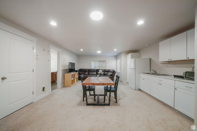 4576 W Sentry Dr, Riverton, UT 84096 - dining space featuring recessed lighting, light carpet, and baseboards