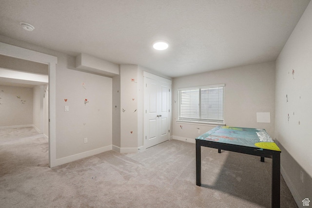 4576 W Sentry Dr, Riverton, UT 84096 - rec room with carpet flooring and baseboards