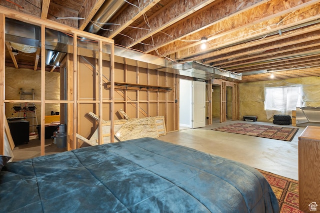869 N Petro Dr W, Tooele, UT 84074 - bedroom featuring unfinished concrete floors