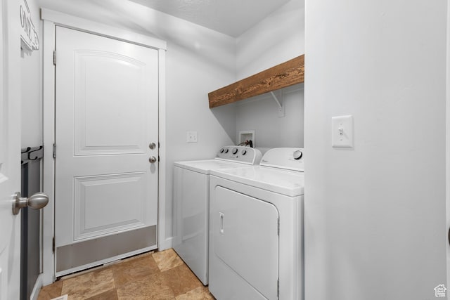 869 N Petro Dr W, Tooele, UT 84074 - laundry room with independent washer and dryer, laundry area, and stone finish flooring