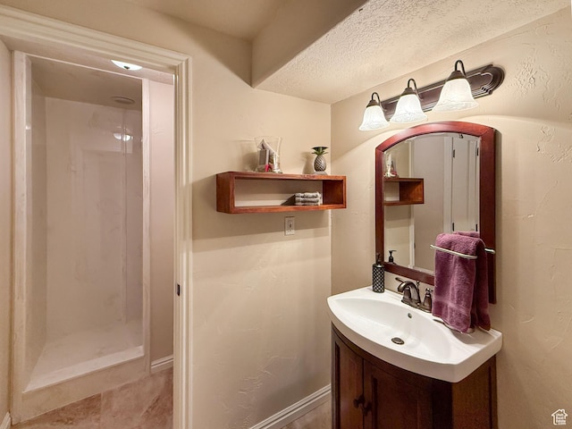 4116 N 800 W, Pleasant View, UT 84414 - bathroom with vanity, a shower stall, and a textured ceiling