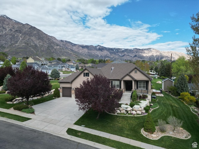 4116 N 800 W, Pleasant View, UT 84414 - ranch-style house with a front lawn, stucco siding, an attached garage, a mountain view, and driveway