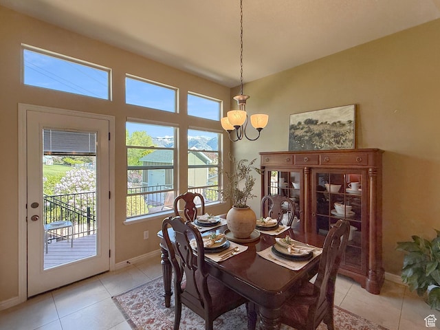 4116 N 800 W, Pleasant View, UT 84414 - dining space featuring baseboards, light tile patterned floors, and a chandelier