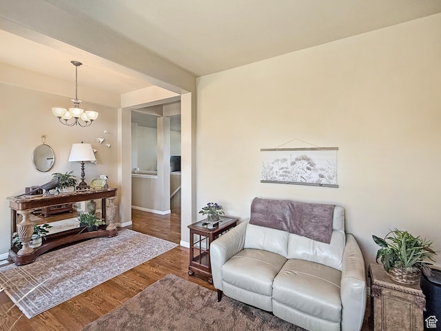 4116 N 800 W, Pleasant View, UT 84414 - living room with baseboards, wood finished floors, and a chandelier