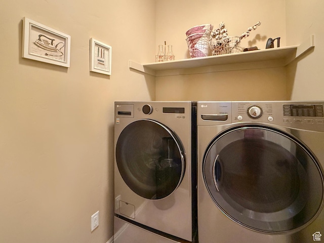 4116 N 800 W, Pleasant View, UT 84414 - clothes washing area featuring separate washer and dryer and laundry area
