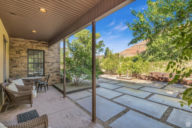 view of patio / terrace with a fenced backyard and outdoor dining space