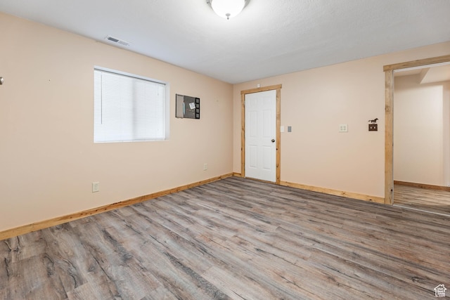 609 E 900 S, Stockton, UT 84071 - empty room featuring baseboards, visible vents, and wood finished floors