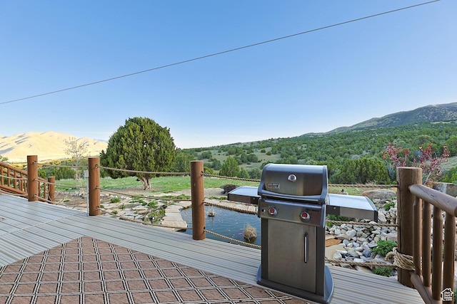 609 E 900 S, Stockton, UT 84071 - wooden deck featuring a mountain view and a grill