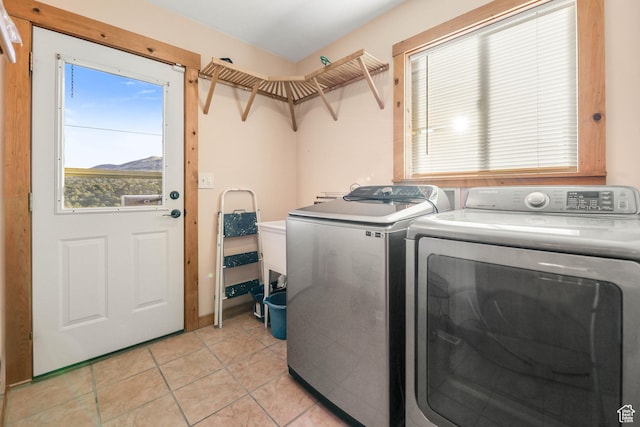 609 E 900 S, Stockton, UT 84071 - laundry area featuring separate washer and dryer, laundry area, and light tile patterned flooring