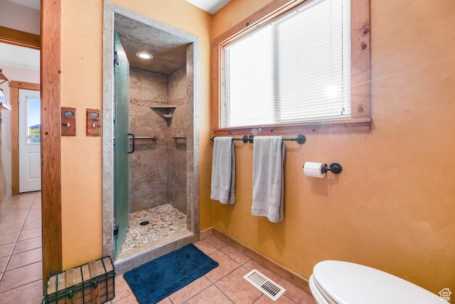 609 E 900 S, Stockton, UT 84071 - bathroom with visible vents, toilet, baseboards, tile patterned floors, and a stall shower