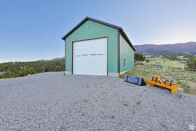 609 E 900 S, Stockton, UT 84071 - detached garage featuring a mountain view and gravel driveway