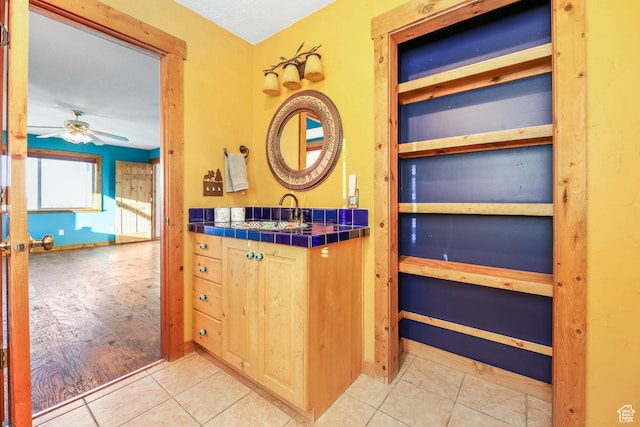 609 E 900 S, Stockton, UT 84071 - bathroom featuring a ceiling fan, tile patterned flooring, and vanity