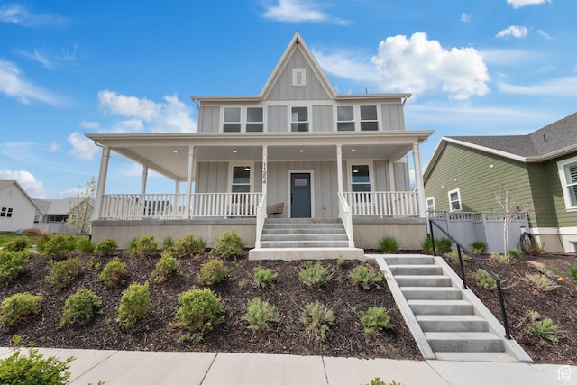 11254 S Bingham Rim Rd W, South Jordan, UT 84009 - view of front of property with board and batten siding, covered porch, and stairs