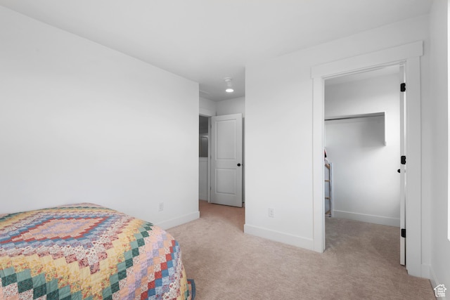 11254 S Bingham Rim Rd W, South Jordan, UT 84009 - bedroom with carpet floors, baseboards, and a spacious closet