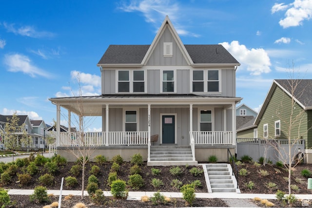 11254 S Bingham Rim Rd W, South Jordan, UT 84009 - view of front facade featuring board and batten siding, a porch, stairway, metal roof, and roof with shingles