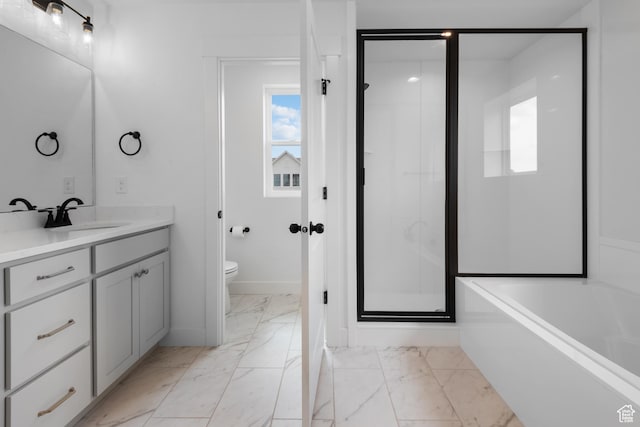 11254 S Bingham Rim Rd W, South Jordan, UT 84009 - bathroom featuring marble finish flooring, a shower stall, toilet, vanity, and a garden tub