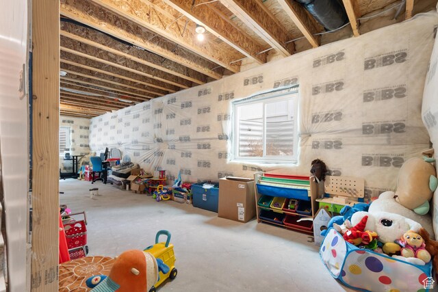 11254 S Bingham Rim Rd W, South Jordan, UT 84009 - game room with plenty of natural light and concrete flooring