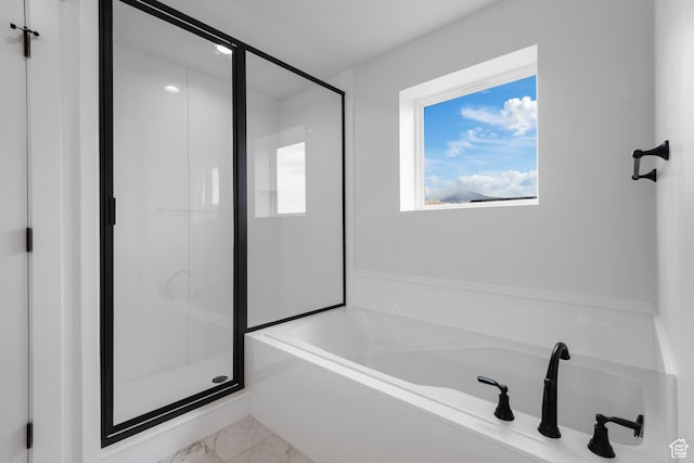 11254 S Bingham Rim Rd W, South Jordan, UT 84009 - bathroom featuring a shower stall, marble look tile flooring, and a bath