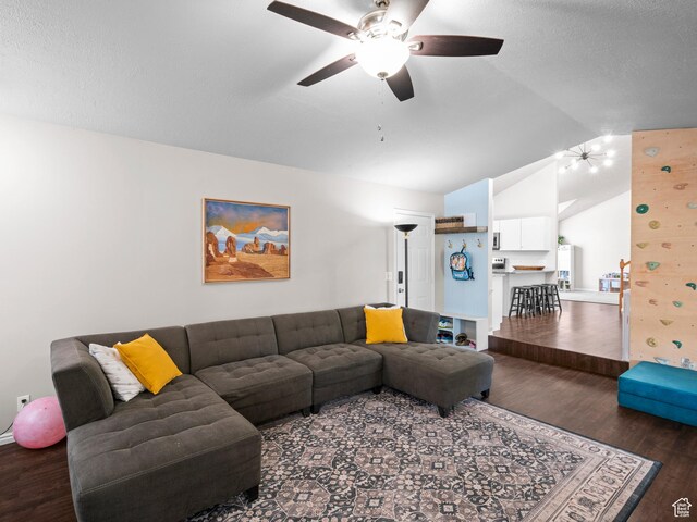 3855 W Elwood Way S, West Jordan, UT 84088 - living area featuring wood finished floors, a ceiling fan, baseboards, and lofted ceiling