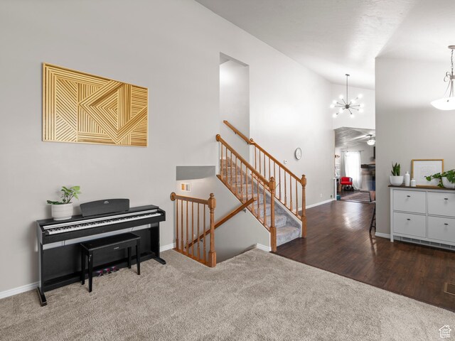 3855 W Elwood Way S, West Jordan, UT 84088 - interior space featuring baseboards, high vaulted ceiling, and a notable chandelier