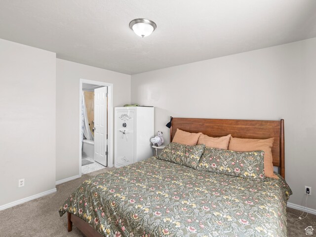 3855 W Elwood Way S, West Jordan, UT 84088 - bedroom featuring baseboards, carpet flooring, and ensuite bath