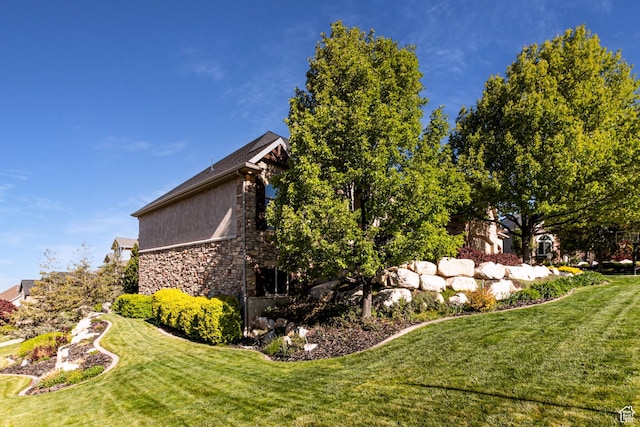 398 S Lofty Ln E, North Salt Lake, UT 84054 - view of side of home with a lawn and stone siding