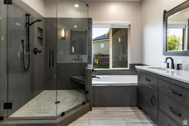 398 S Lofty Ln E, North Salt Lake, UT 84054 - bathroom featuring vanity, a shower stall, recessed lighting, and a garden tub