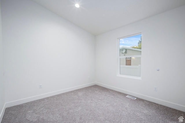 92 N 300 W, American Fork, UT 84003 - spare room featuring carpet flooring, baseboards, and vaulted ceiling
