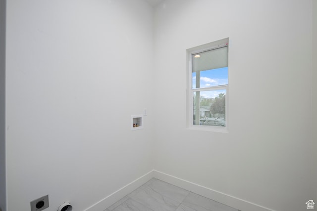92 N 300 W, American Fork, UT 84003 - laundry area featuring baseboards, hookup for a washing machine, hookup for an electric dryer, and light marble finish floors