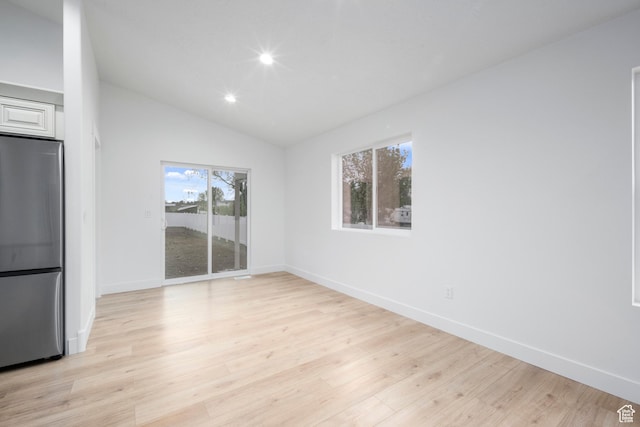 92 N 300 W, American Fork, UT 84003 - unfurnished dining area with lofted ceiling, light wood-type flooring, recessed lighting, and baseboards