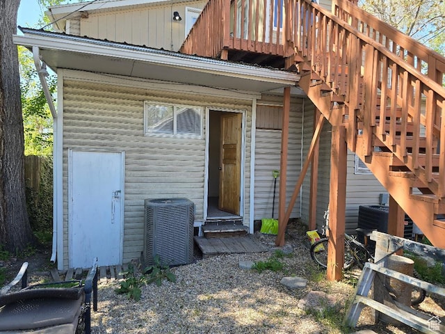 567 S 800 E, Salt Lake City, UT 84102 - view of exterior entry with cooling unit and board and batten siding