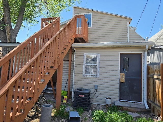 567 S 800 E, Salt Lake City, UT 84102 - back of house with stairs, cooling unit, a wooden deck, and fence
