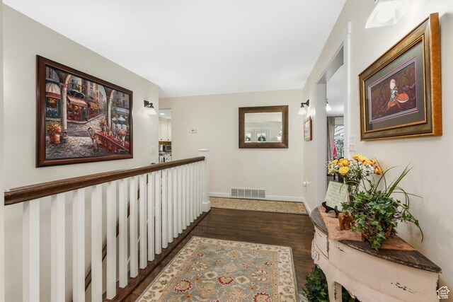3273 E Bernada Dr, Salt Lake City, UT 84124 - hall with baseboards, visible vents, and dark wood finished floors
