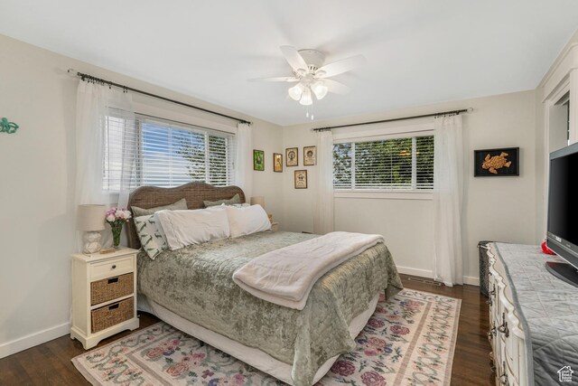 3273 E Bernada Dr, Salt Lake City, UT 84124 - bedroom with baseboards, ceiling fan, and dark wood-style floors