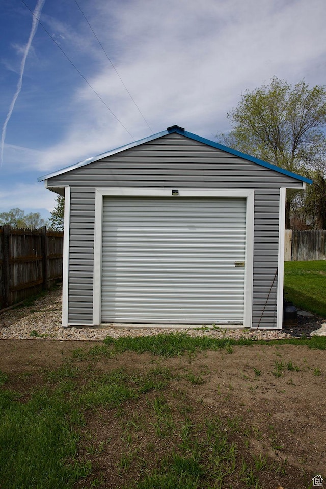 detached garage with fence