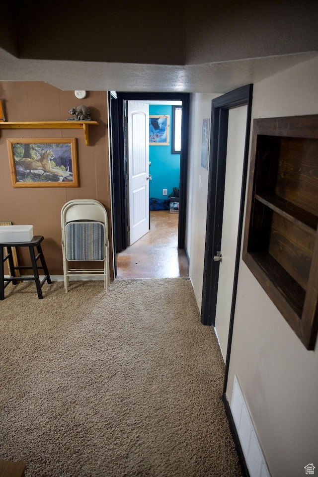 hallway with carpet