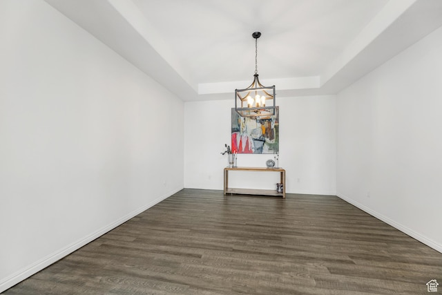 531 E Valley Dr, Heber City, UT 84032 - spare room with an inviting chandelier, baseboards, dark wood-type flooring, and a tray ceiling
