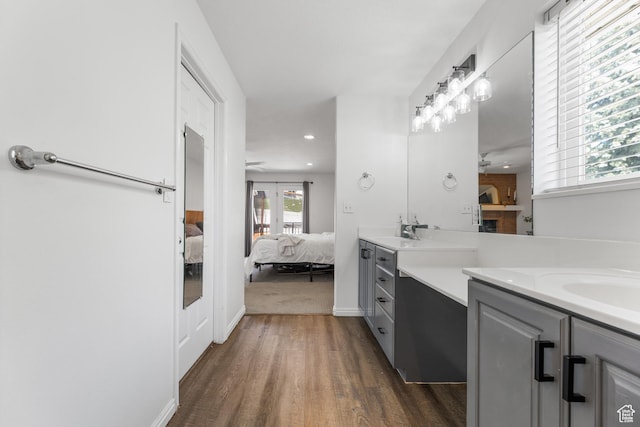 531 E Valley Dr, Heber City, UT 84032 - full bathroom with connected bathroom, vanity, french doors, a ceiling fan, and wood finished floors