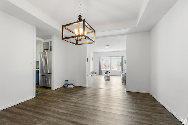 531 E Valley Dr, Heber City, UT 84032 - unfurnished dining area featuring baseboards, dark wood finished floors, and a chandelier
