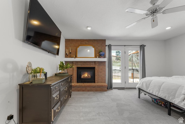 531 E Valley Dr, Heber City, UT 84032 - bedroom with access to outside, recessed lighting, a brick fireplace, and light carpet