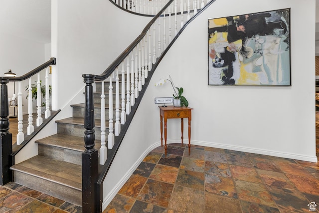 531 E Valley Dr, Heber City, UT 84032 - staircase with baseboards and stone tile flooring