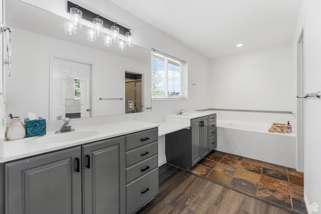 531 E Valley Dr, Heber City, UT 84032 - bathroom with a sink, a garden tub, recessed lighting, and two vanities