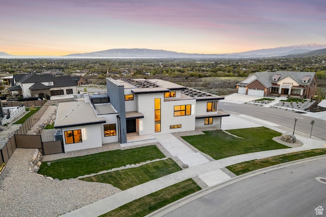 3944 W Oak Hill Dr, Alpine, UT 84004 - view of front of house with a mountain view, stucco siding, and fence private yard