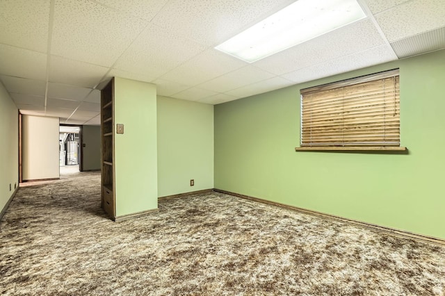 4758 S Mocha Dr W, Taylorsville, UT 84129 - basement with carpet floors, a paneled ceiling, and baseboards