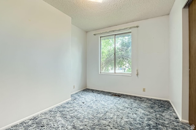 4758 S Mocha Dr W, Taylorsville, UT 84129 - carpeted empty room featuring a textured ceiling, visible vents, and baseboards