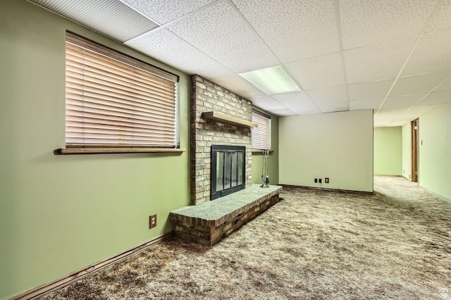 4758 S Mocha Dr W, Taylorsville, UT 84129 - unfurnished living room featuring a drop ceiling, carpet, and a fireplace