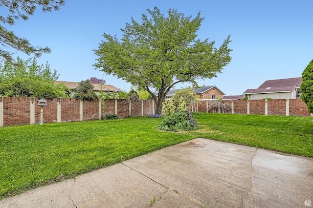4758 S Mocha Dr W, Taylorsville, UT 84129 - view of yard featuring a patio and fence